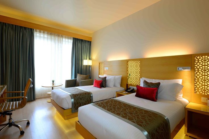 Twin hotel room in Kenya with two beds